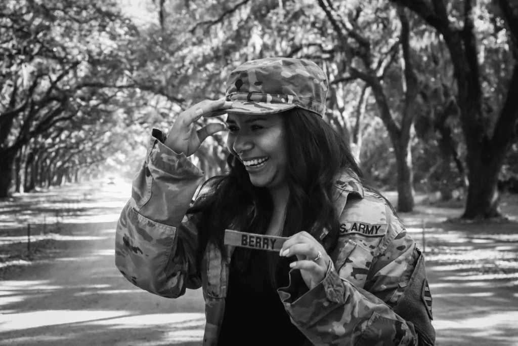 black-white-photo-woman-military-uniform-smiling