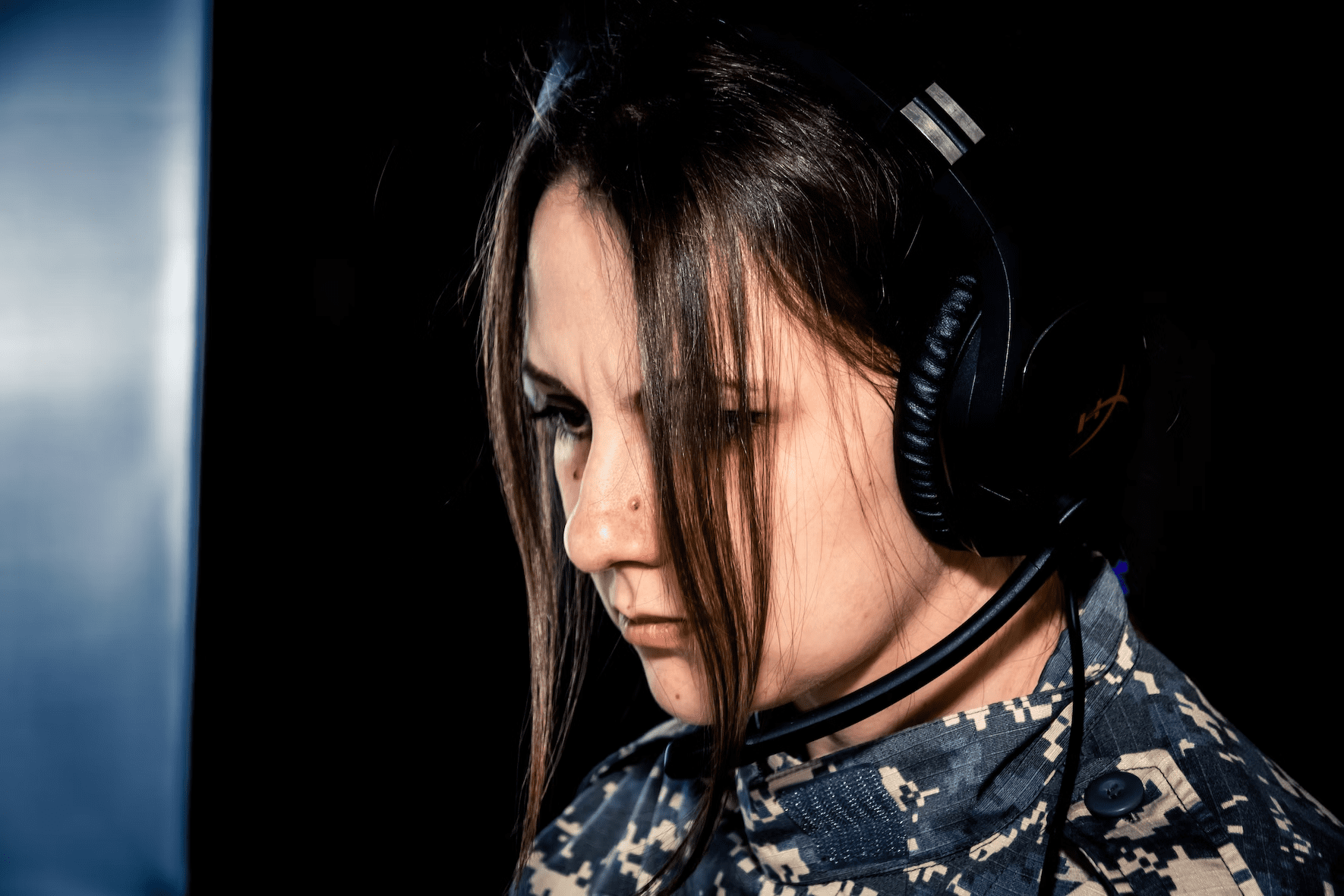 woman-in-military-camo-headphones