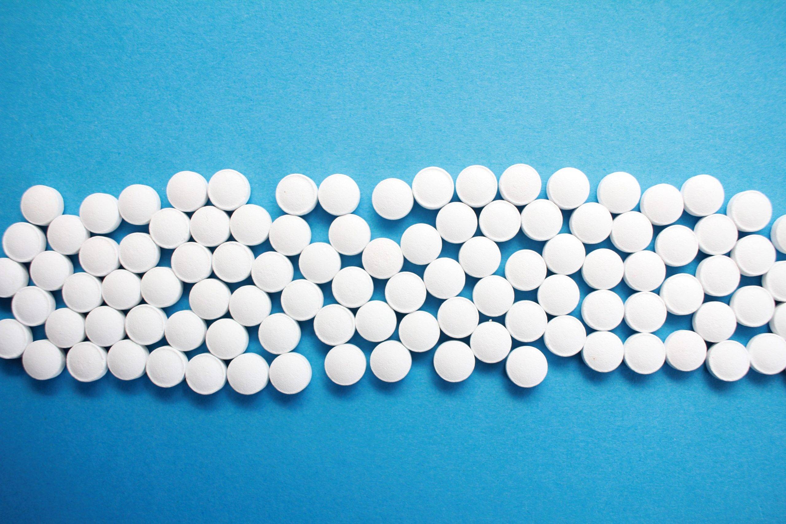 blue-background-white-mifepristone-pills
